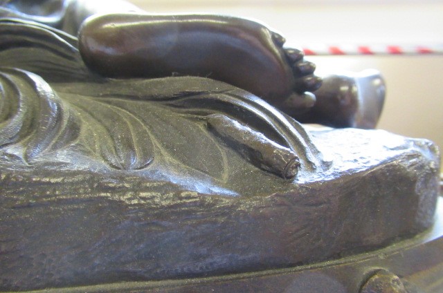 A FRENCH PATINATED AND GILT BRONZE MANTEL CLOCK Image