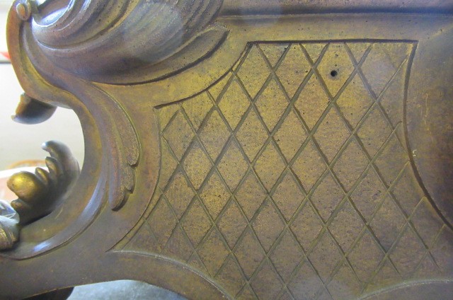 A FRENCH PATINATED AND GILT BRONZE MANTEL CLOCK Image