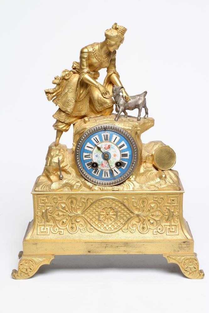 A FRENCH GILT METAL AND SILVERED MANTEL CLOCK Image