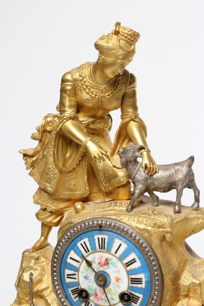 A FRENCH GILT METAL AND SILVERED MANTEL CLOCK Image
