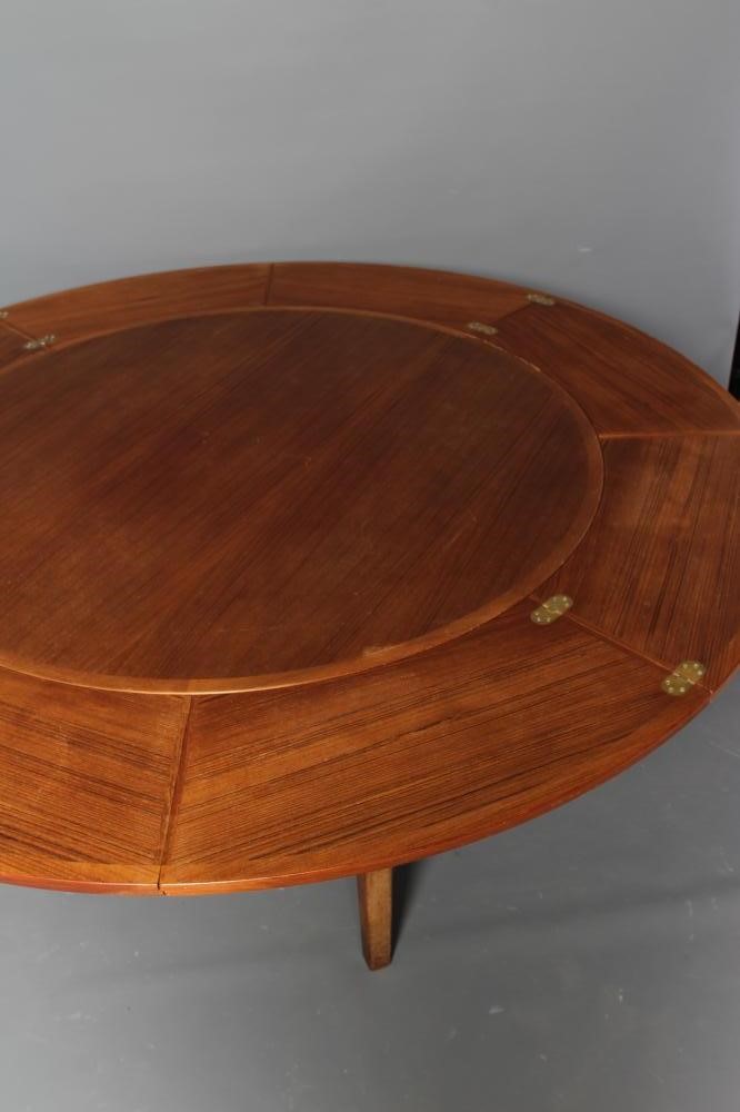 A DANISH DYRLAND TEAK EXTENDING DINING TABLE Image