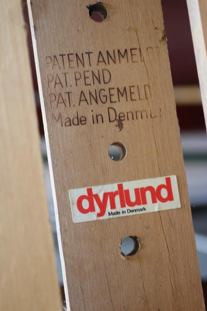 A DANISH DYRLAND TEAK EXTENDING DINING TABLE Image