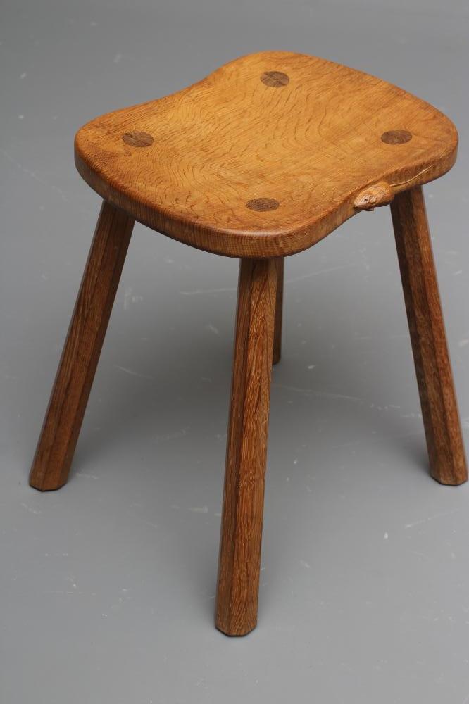 A ROBERT THOMPSON ADZED OAK STOOL Image