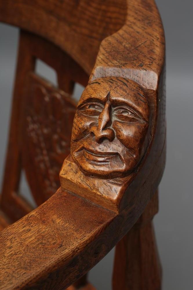 A RARE ROBERT THOMPSON ADZED OAK MONKS CHAIR Image