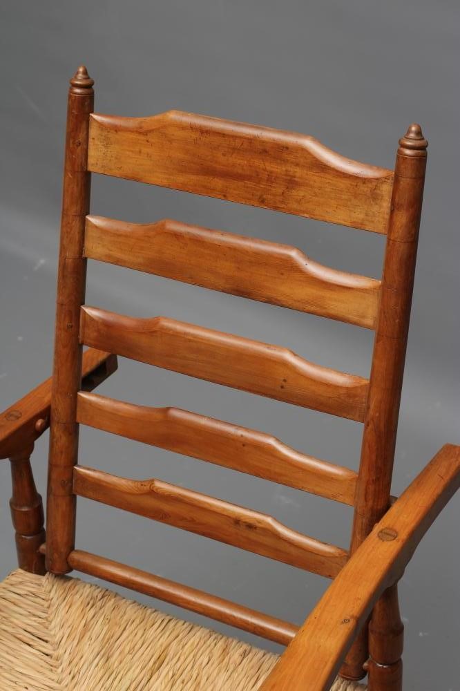 A PAIR OF GORDON RUSSELL ARTS AND CRAFTS STYLE FRUITWOOD ARMCHAIRS Image