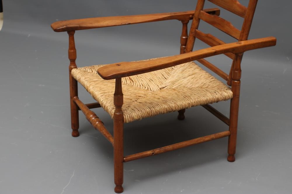 A PAIR OF GORDON RUSSELL ARTS AND CRAFTS STYLE FRUITWOOD ARMCHAIRS Image