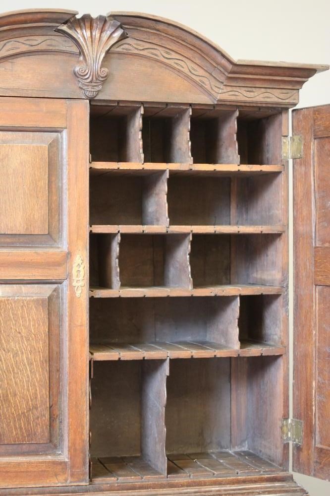 A GEORGIAN OAK BUREAU BOOKCASE Image