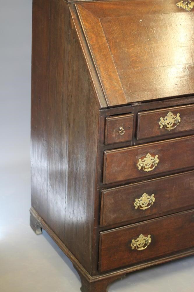 A GEORGIAN OAK BUREAU BOOKCASE Image