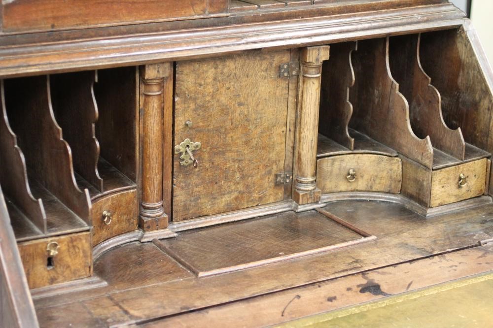 A GEORGIAN OAK BUREAU BOOKCASE Image