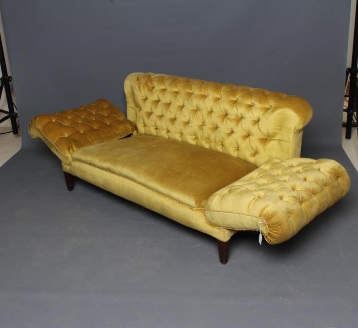 AN EDWARDIAN MAHOGANY FRAMED CHESTERFIELD SOFA with drop ends Image