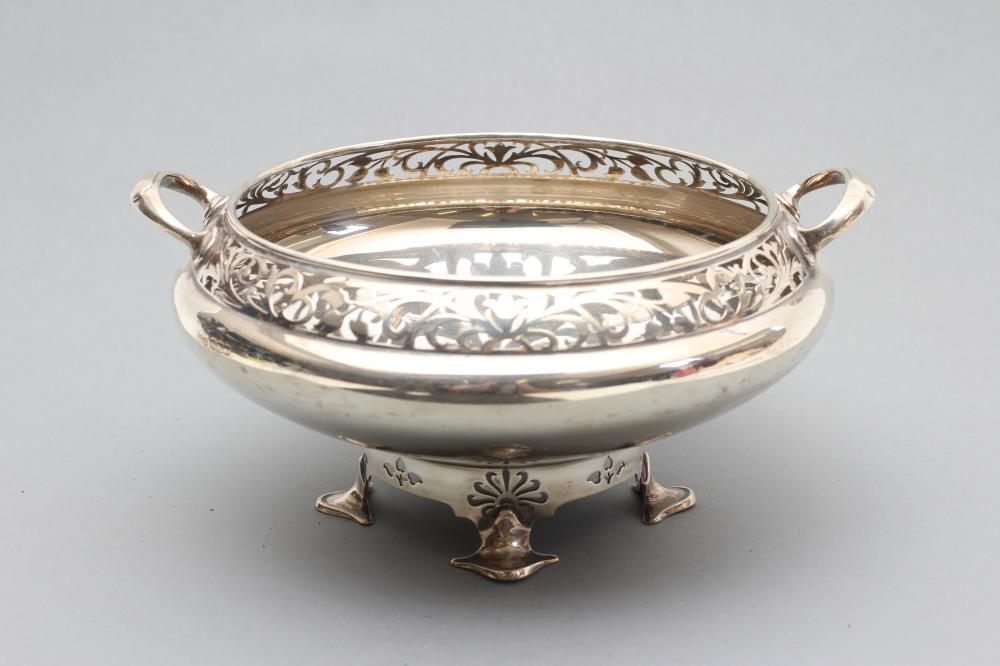 A TWO HANDLED FRUIT BOWL Image