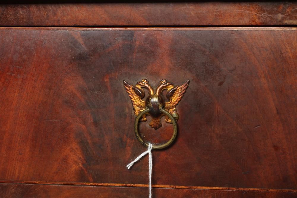 A REGENCY MAHOGANY DRESSING TABLE of mildly bowed oblong form Image