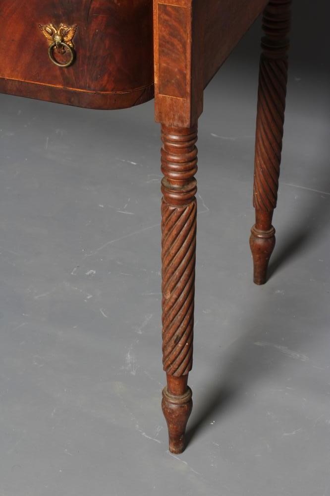 A REGENCY MAHOGANY DRESSING TABLE of mildly bowed oblong form Image