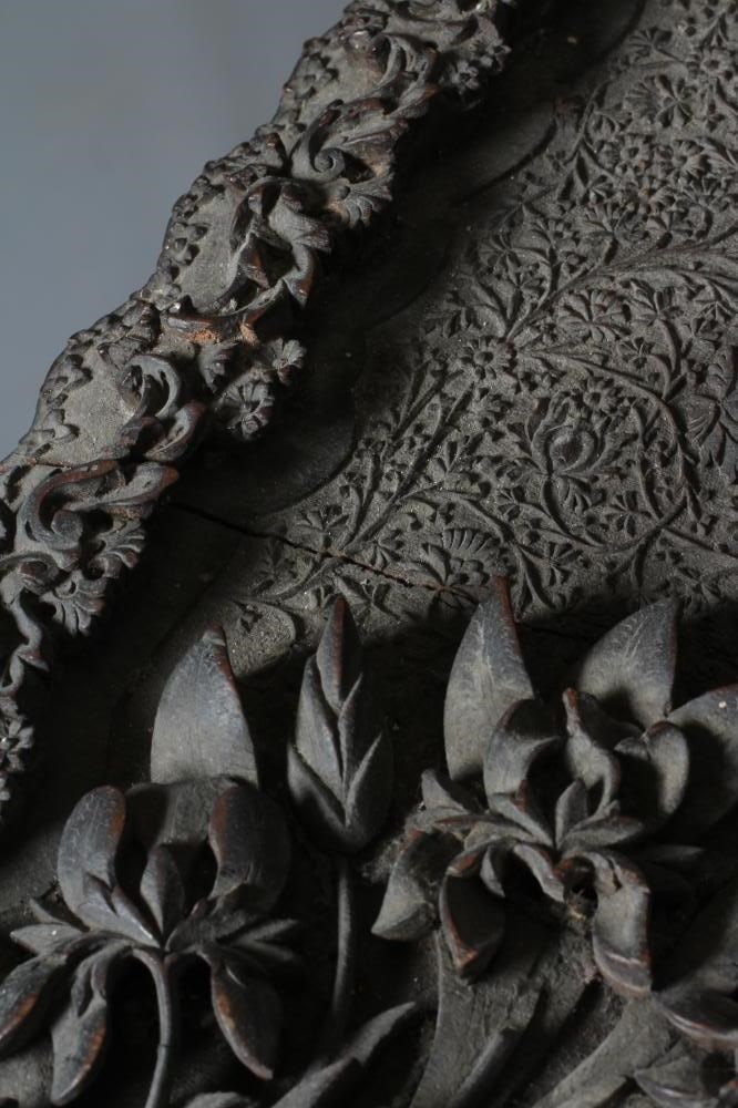 AN INDIAN KASHMIRE MERCHANT'S HARDWOOD KNEEHOLE DESK of oblong form profusely carved in high and low Image