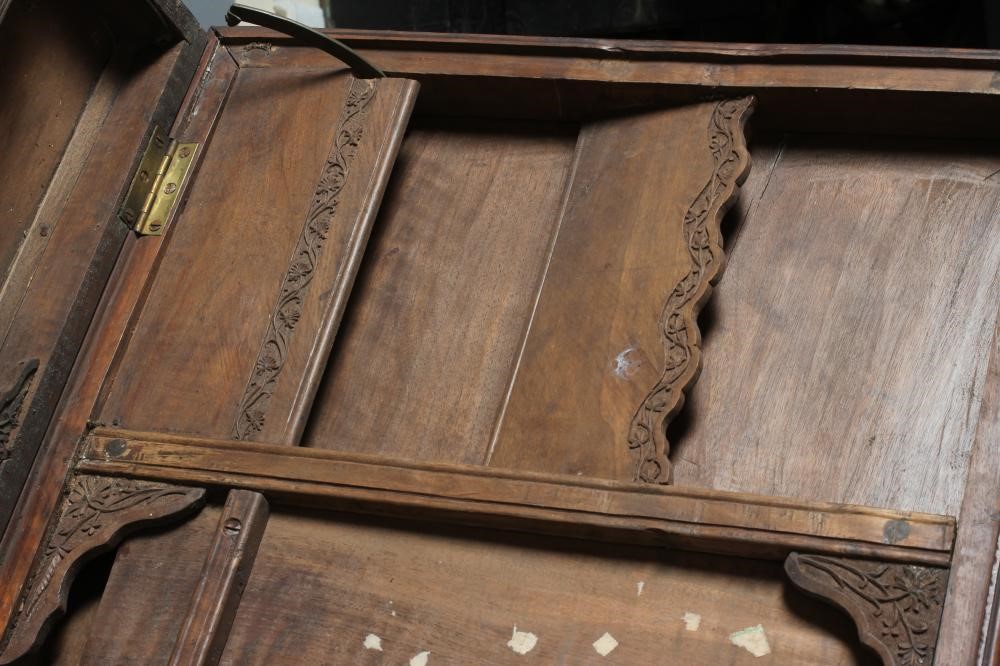 AN INDIAN KASHMIRE MERCHANT'S HARDWOOD KNEEHOLE DESK of oblong form profusely carved in high and low Image