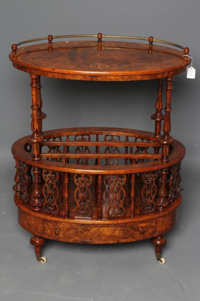 A VICTORIAN BURR WALNUT CANTERBURY/WHATNOT of oval form with stringing and foliate marquetry Image