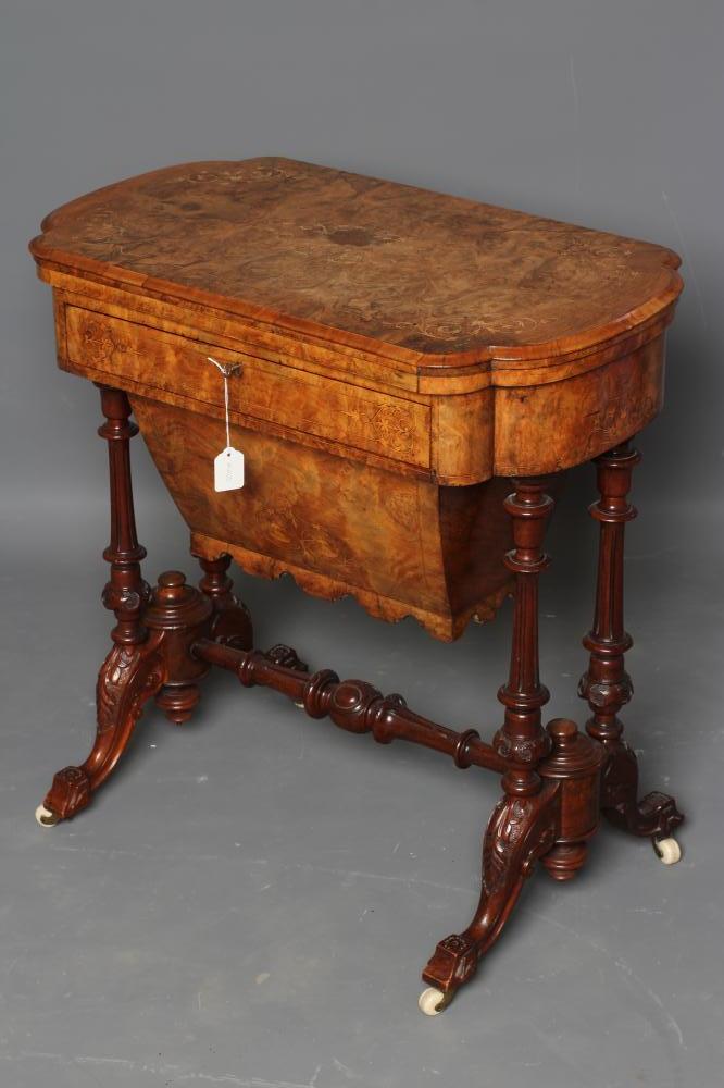 A VICTORIAN BURR WALNUT GAMES/WORK TABLE of shaped oblong form with stringing and foliate marquetry Image