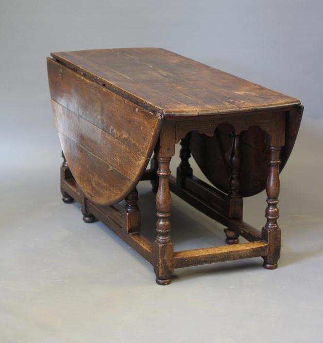 A WILLIAM & MARY JOINED OAK DROP LEAF DINING TABLE Image