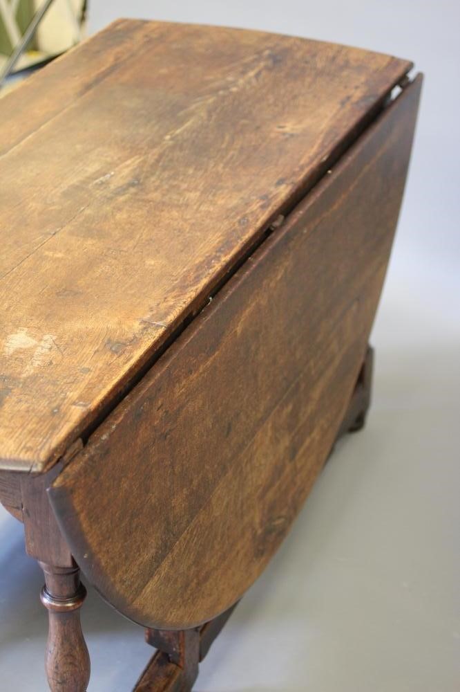 A WILLIAM & MARY JOINED OAK DROP LEAF DINING TABLE Image