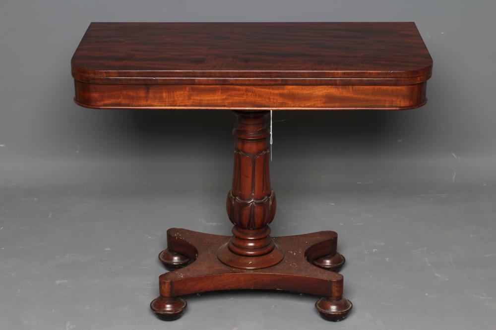 AN EARLY VICTORIAN MAHOGANY FOLDING TEA TABLE Image