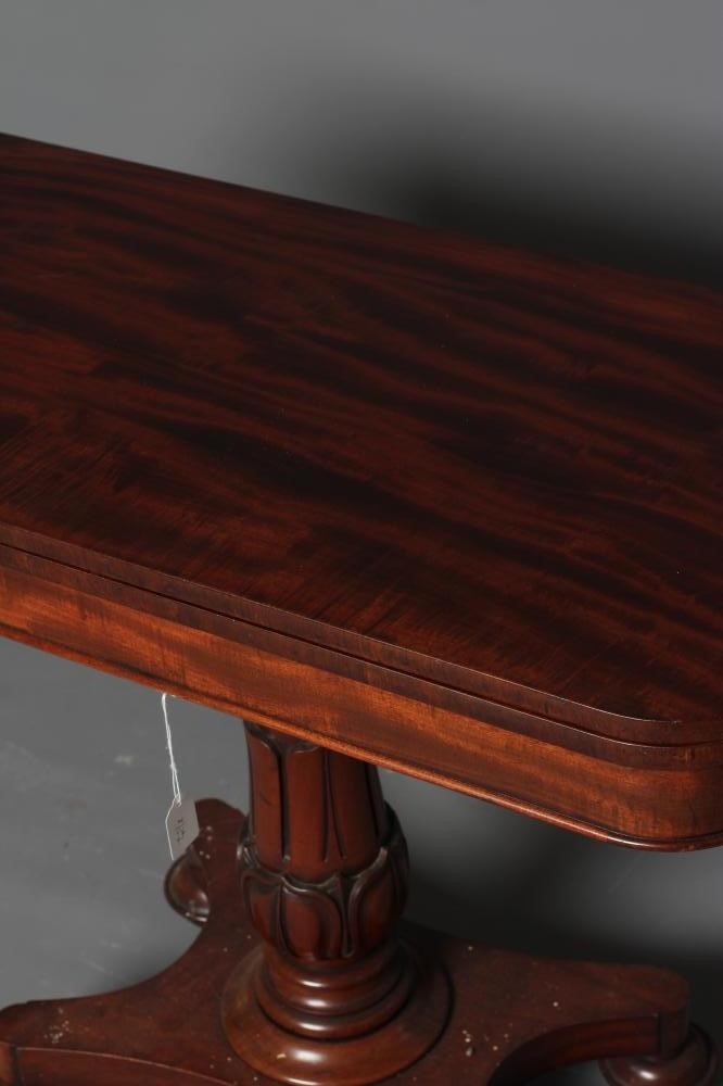 AN EARLY VICTORIAN MAHOGANY FOLDING TEA TABLE Image