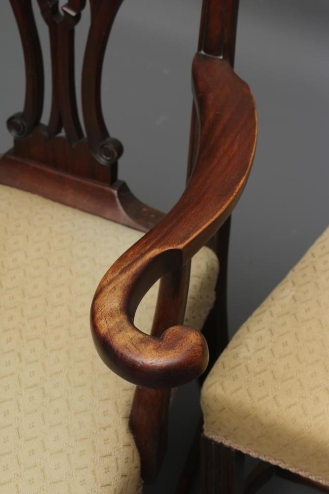 A SET OF EIGHT MAHOGANY CHIPPENDALE REVIVAL CHAIRS including two elbow chairs Image