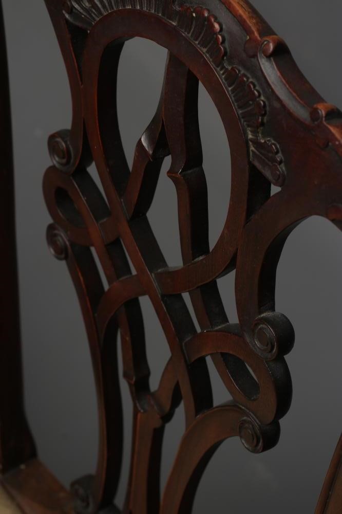 A SET OF EIGHT MAHOGANY CHIPPENDALE REVIVAL CHAIRS including two elbow chairs Image