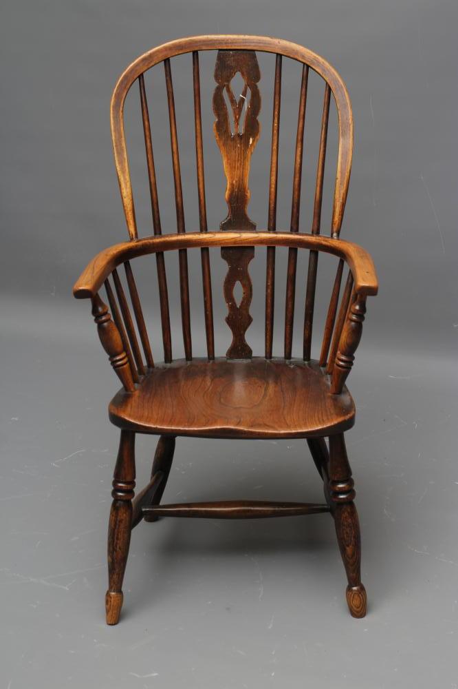 AN ASH AND ELM WINDSOR ARMCHAIR Image