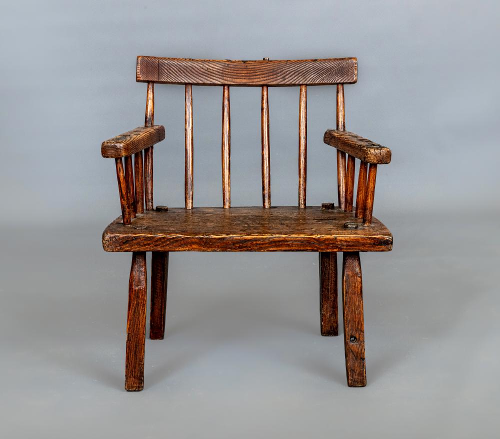 A PRIMITIVE ASH COMB BACK ARMCHAIR Image