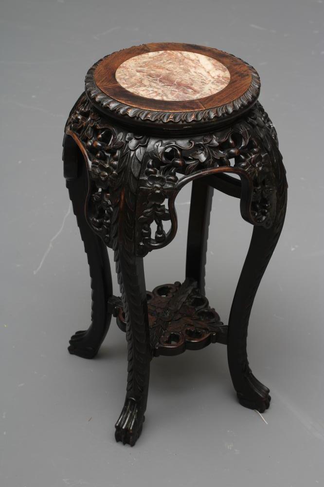 A CHINESE PADOUK WOOD JARDINIERE STAND Image