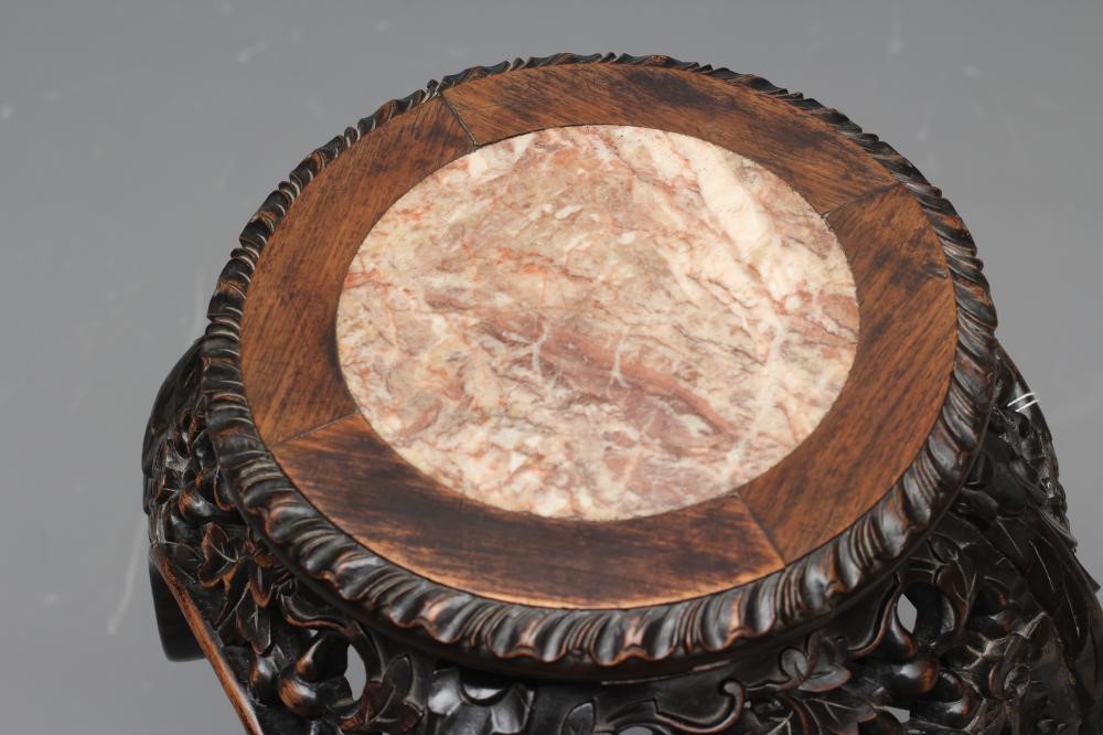 A CHINESE PADOUK WOOD JARDINIERE STAND Image