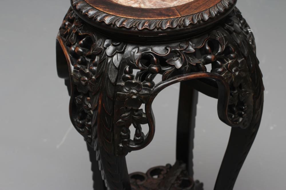 A CHINESE PADOUK WOOD JARDINIERE STAND Image