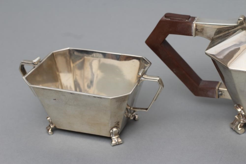 AN ART DECO COMPOSITE THREE PIECE TEA SERVICE Image