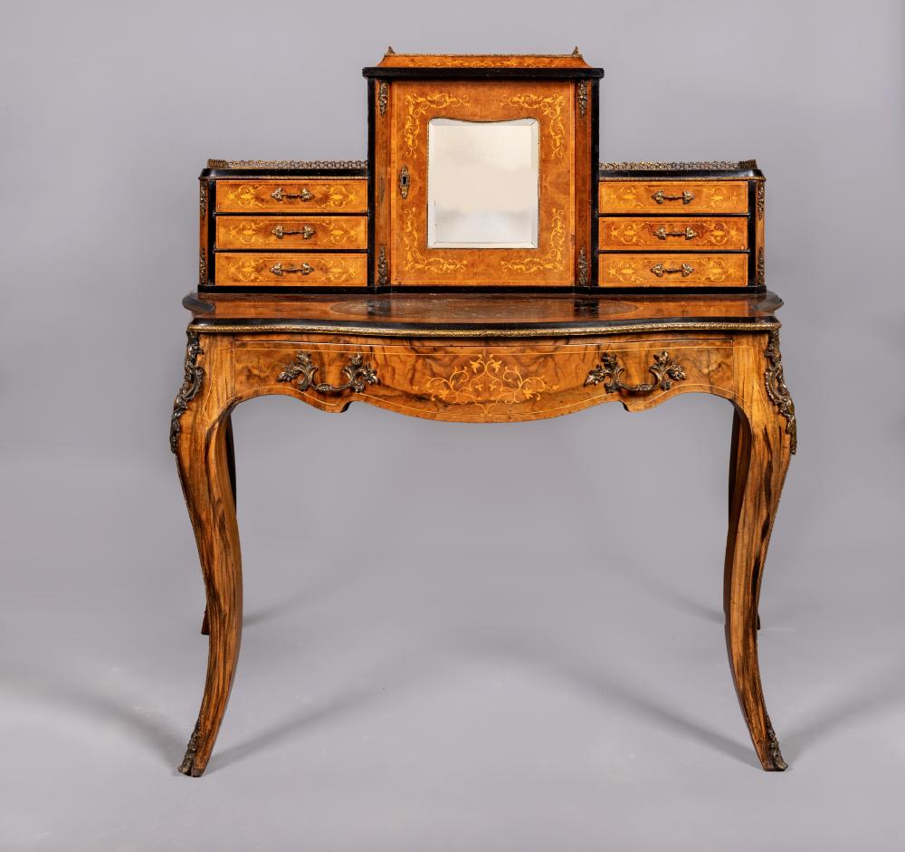 A VICTORIAN BURR WALNUT AND EBONISED BONHEUR DU JOUR with foliate marquetry and gilt metal mounts Image