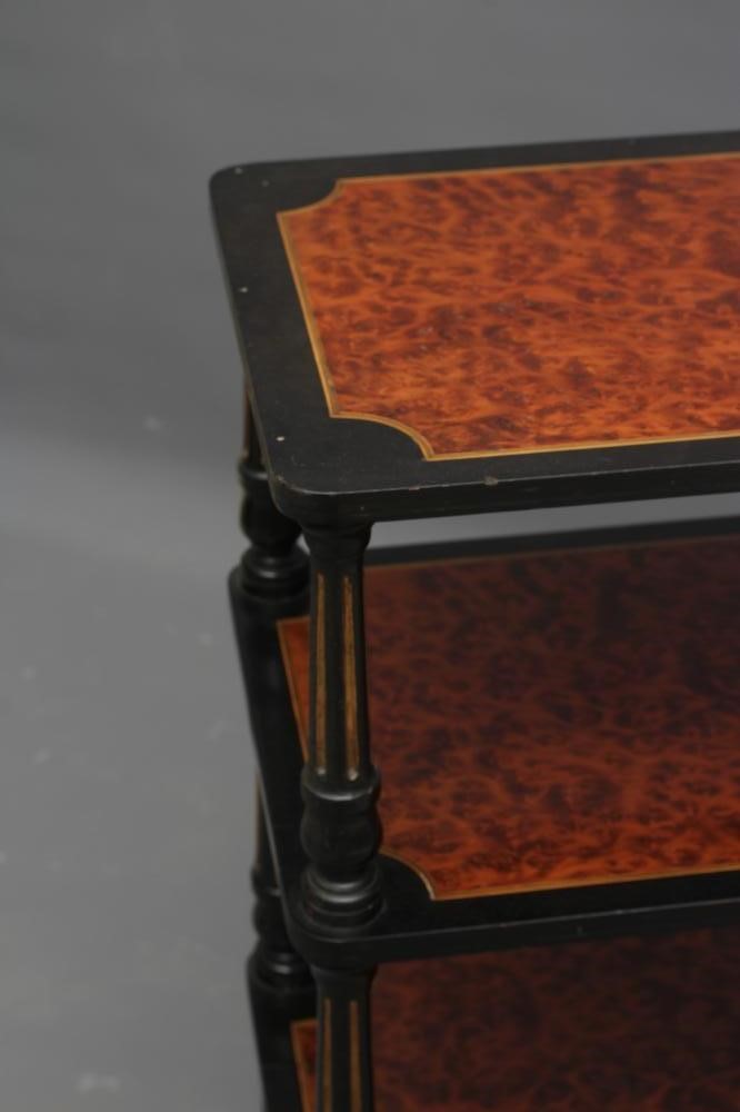 A VICTORIAN AMBOYNA AND PARCEL GILT EBONISED THREE TIER WHATNOT of rounded oblong form with Image