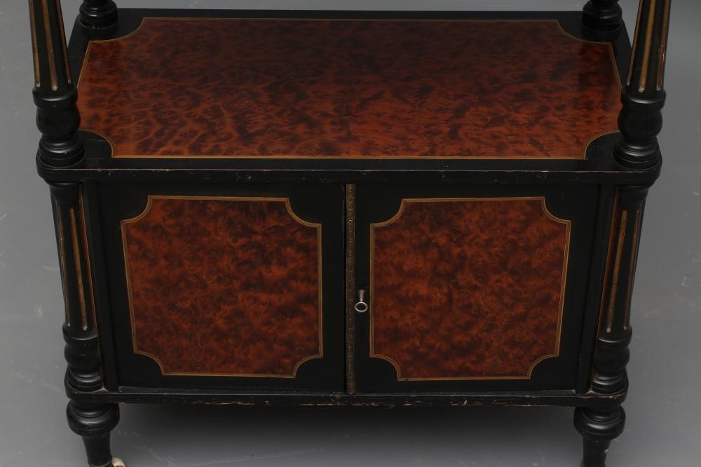 A VICTORIAN AMBOYNA AND PARCEL GILT EBONISED THREE TIER WHATNOT of rounded oblong form with Image