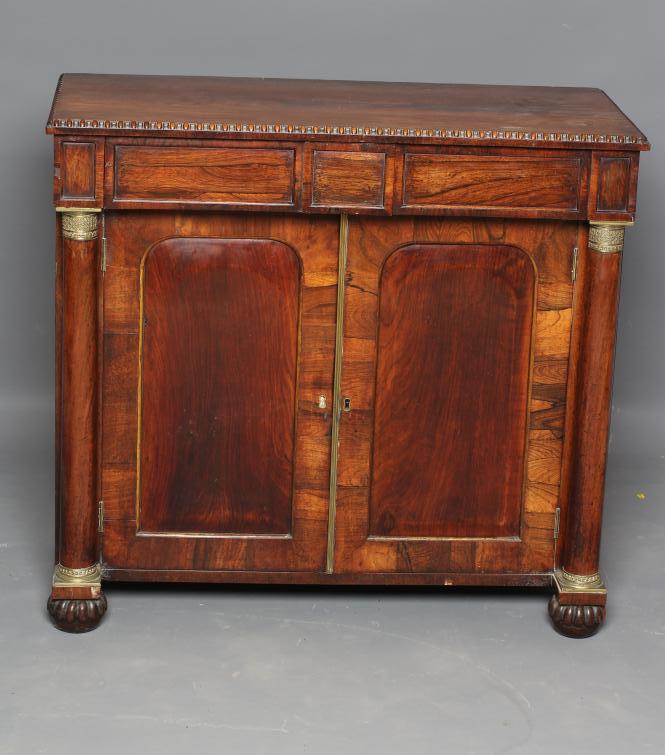 A SMALL REGENCY ROSEWOOD SIDE CABINET Image