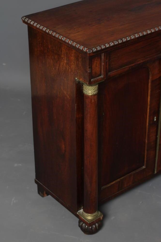 A SMALL REGENCY ROSEWOOD SIDE CABINET Image