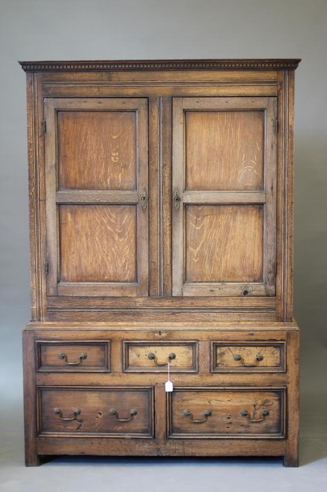 A JOINED OAK CLOTHES CUPBOARD Image
