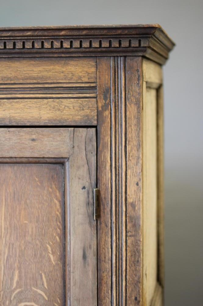 A JOINED OAK CLOTHES CUPBOARD Image
