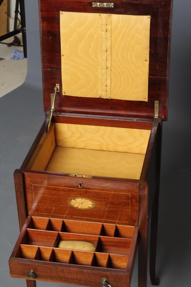 AN EDWARDIAN MAHOGANY SEWING TABLE of oblong form with stringing Image