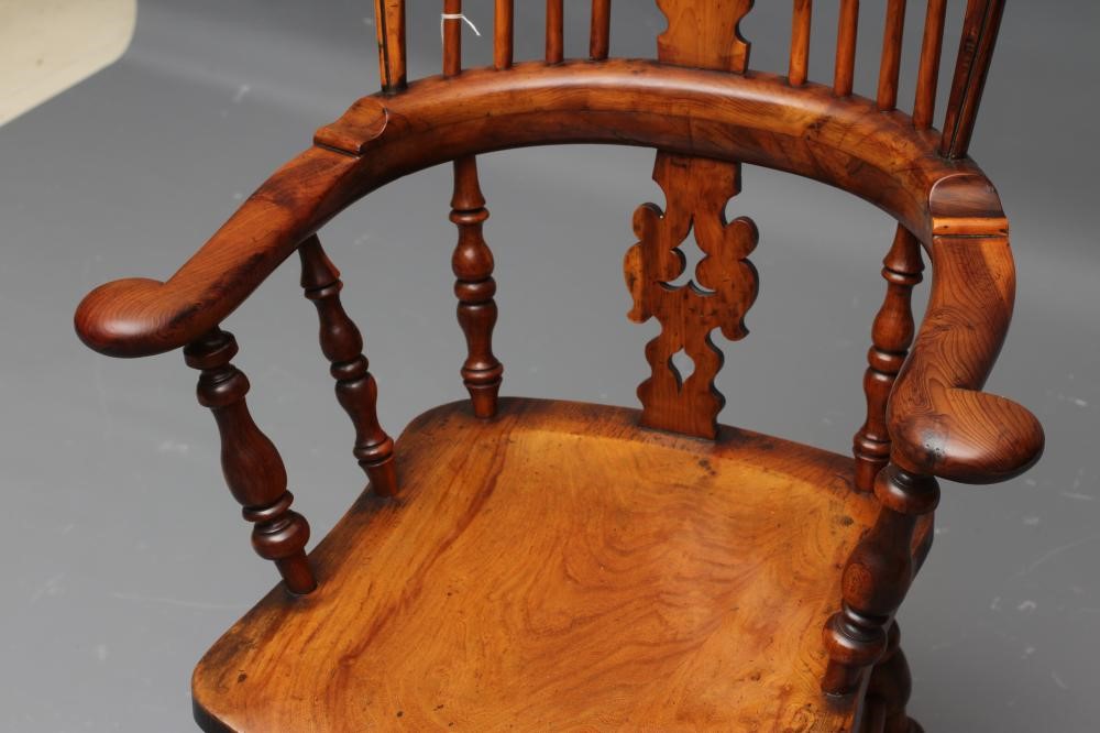 A YEW AND ELM WINDSOR ARMCHAIR Image