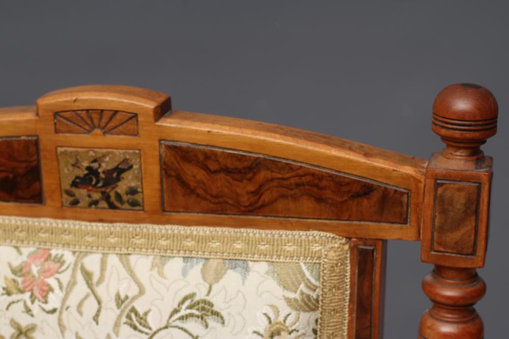 A SET OF THREE VICTORIAN AESTHETIC SATINWOOD SALON SIDE CHAIRS upholstered in an ivory ground floral Image