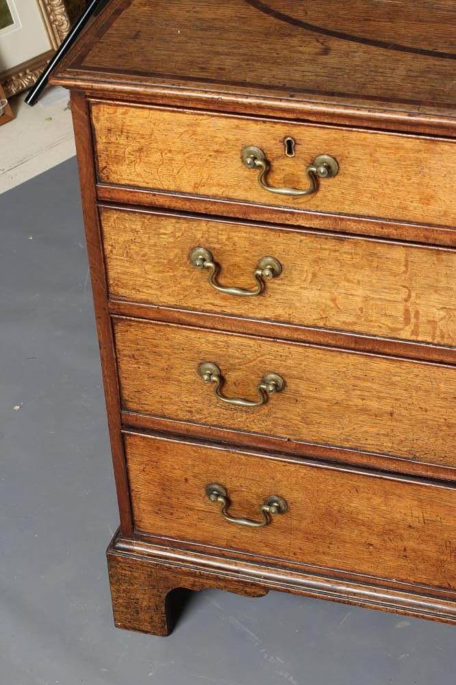 A GEORGIAN OAK AND MAHOGANY BANDED CHEST Image