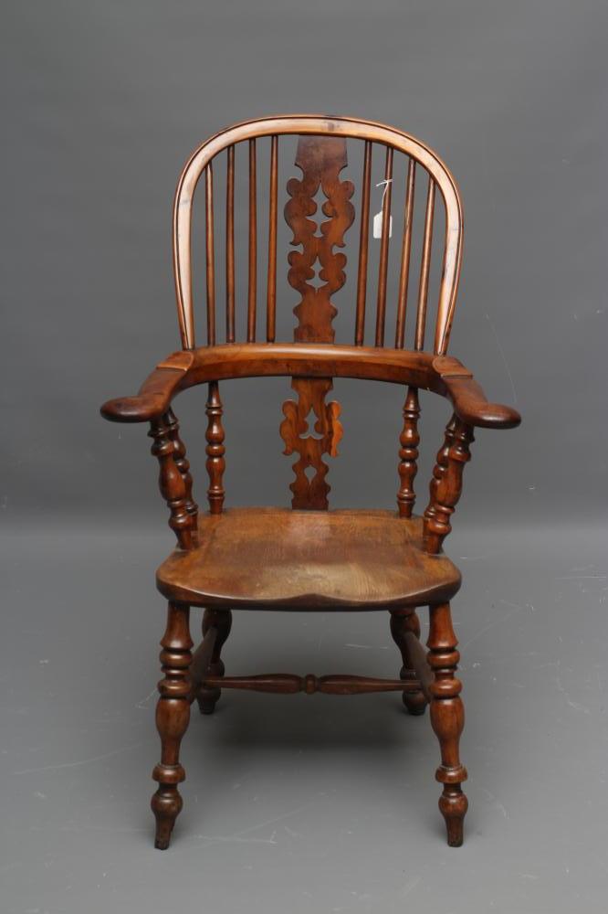 A YEW AND ELM WINDSOR ARMCHAIR Image