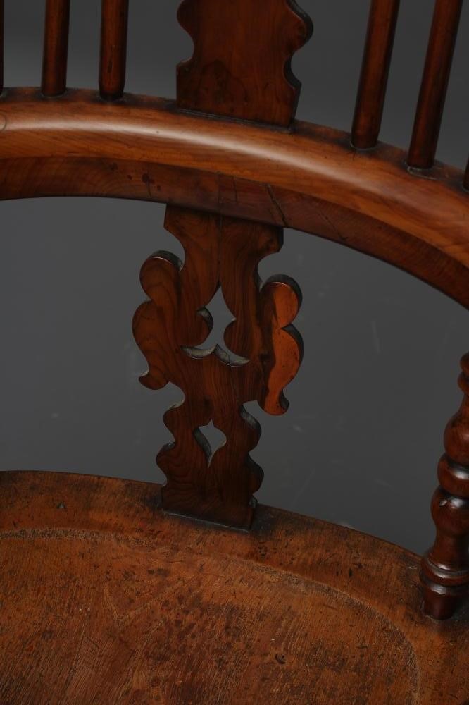 A YEW AND ELM WINDSOR ARMCHAIR Image