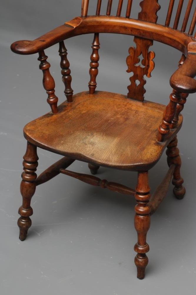 A YEW AND ELM WINDSOR ARMCHAIR Image