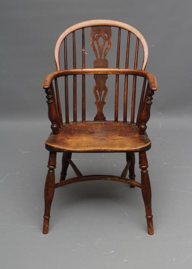 A YEW AND ELM WINDSOR ARMCHAIR Image