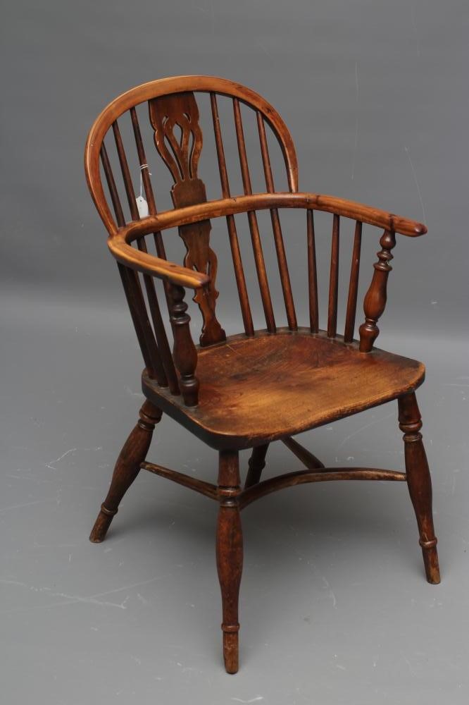 A YEW AND ELM WINDSOR ARMCHAIR Image