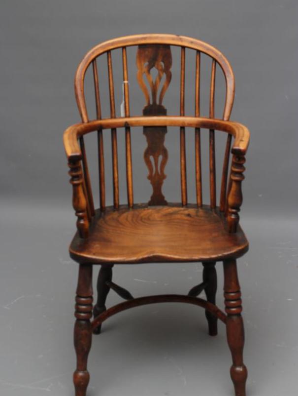 A YEW AND ELM WINDSOR ARMCHAIR Image